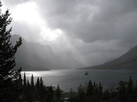 Picture of Wild Goose Island and St. Mary Lake under a veil of stormy clouds