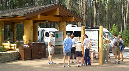 Visitors waiting to board Glacier's shuttle