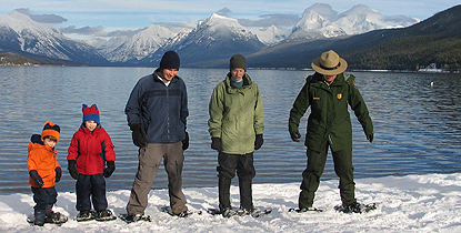 Glacier's Education Specialist leading a snowshoe hike
