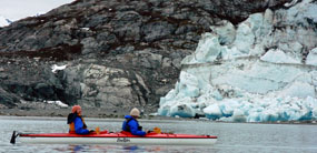 kayakers in front of Lamplugh Glacier