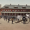 Troops conducting drills in front of Montgomery Street barracks at the Presidio