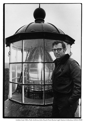 John Dusch, the last lead lighthouse keeper of Point Bonita Light Station, next to the Point Bonita light. (GOGA 35188.73)