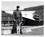 Chuck Dyson and dog, Fort Barry, 1970