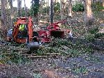Excavator moving slash