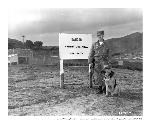 Soldier and dog on sentry duty at Fort Barry's Nike Site, 1959