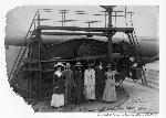Group poses in front of the 12" disappearing gun at Battery Mendell,c1908.