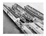Aerial view of the Fort Mason Pier with transport ships, c1950s. 