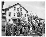 Parade in front of Fort Mason Bldg 201, Headquarters of the San Francisco Port of Embarkation, 29 July 1942.