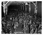 Troops at the Port of Embarkation receive a meal before loading the ships, 1942.