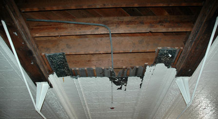 image of tin-pressed ceilings being rehabilitated