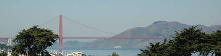view of the Golden Gate Bridge, looking over Fort Mason's Great Meadow