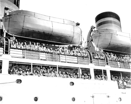 image of soldiers crowded on a ship's deck