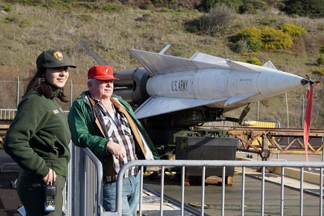 Ranger Socorro and Nike Veteran Al Kellogg pose in front of a Nike Hercules Missile.