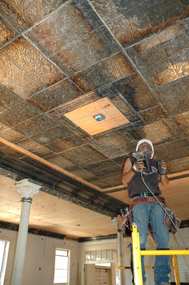 installation of metal ceiling tiles