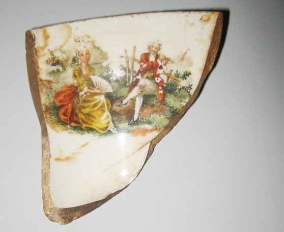 fragment of pottery showing pastoral scene
