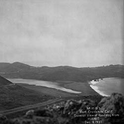 view of Fort Cronkhite from high hill, includes ocean, lagoon, headlands and road.