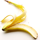 Banana peel laying on the floor.