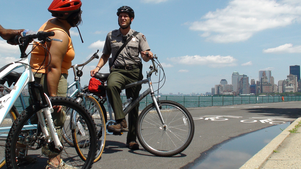A Ranger provides a bike tour on the Island
