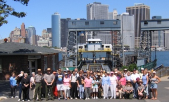 Park Rangers pose with visitors from the final tour of the 2005 Summer Season.