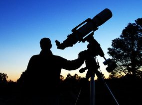 Astronomer at dusk