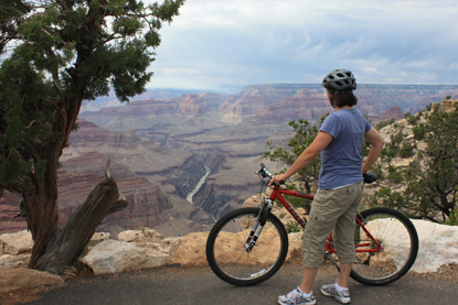 visitor with bike at Grand Canyon