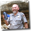 Ranger Patrick Gamman holding water bottle.