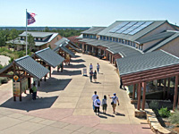 South Rim Visitor Center with people walking.