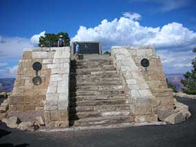 stone Powell Memorial with plaques dedicated to the Powell expedition on sides and top