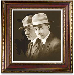 formal portrait of the Kolb Brothers wearing hats