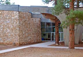 stone building with large arched entry