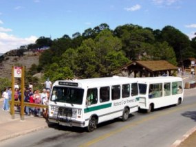 visitors boarding free shuttle bus visitors boarding free shuttle bus