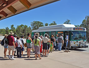 Boarding Village Route bus at the Transit Center.
