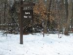 The Azalea Trail sign in the snow