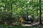 a picture of two tents in the campground