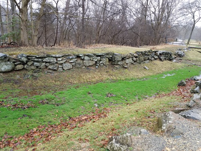 Here is an image of the stone ruins of an upstream portion of the Potomac Canal at Great Falls Park VA without water in it. This would be what visitors normally see when the visit the canal ruins here.