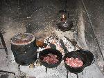 Salt pork, beef and tea prepared in the kitchen.