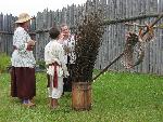 A craftsperson offers a basket workshop.