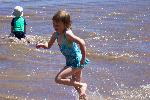 Girl Running in Medano Creek