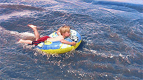 Boy Tubing Medano Creek
