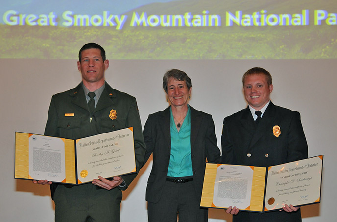 Ranger Griest, Interior Secretary Sally Jewel, and Firefighter Scarbrough pose with their awards.