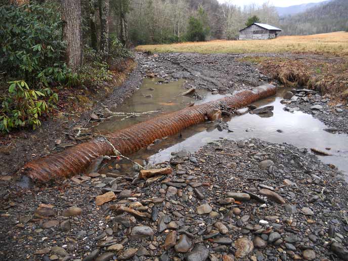 The road in Cataloochee was washed away by a flood.