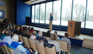 Bear biologist Stephen Herrero speaks at the opening of the new Grand Teton auditorium.