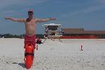 Lifeguard does hand and arm signals