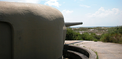 Massive steel housing protects a WWII 6-inch gun battery located in the Fort Pickens Area.