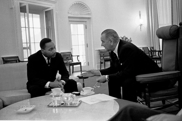 Martin Luther King, Jr., talks with President Lyndon B. Johnson, in the Oval Office on December 3, 1963.
