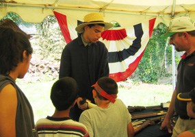 Neal King talks to visitors at the July 4th program