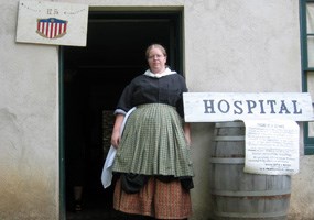 Traci Manning staffs the field hospital during the Soldier's City living history program.