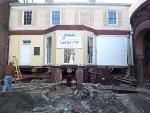 The Grange with foundation siding removed