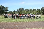 46 mountain bikers pose at the start of their ride