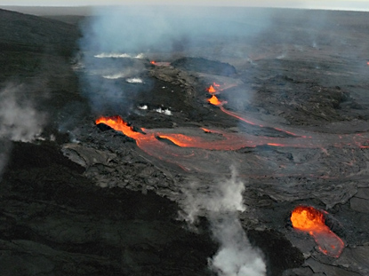 Early morning view of lava flowing out of the west flank vents on Puu Oo.